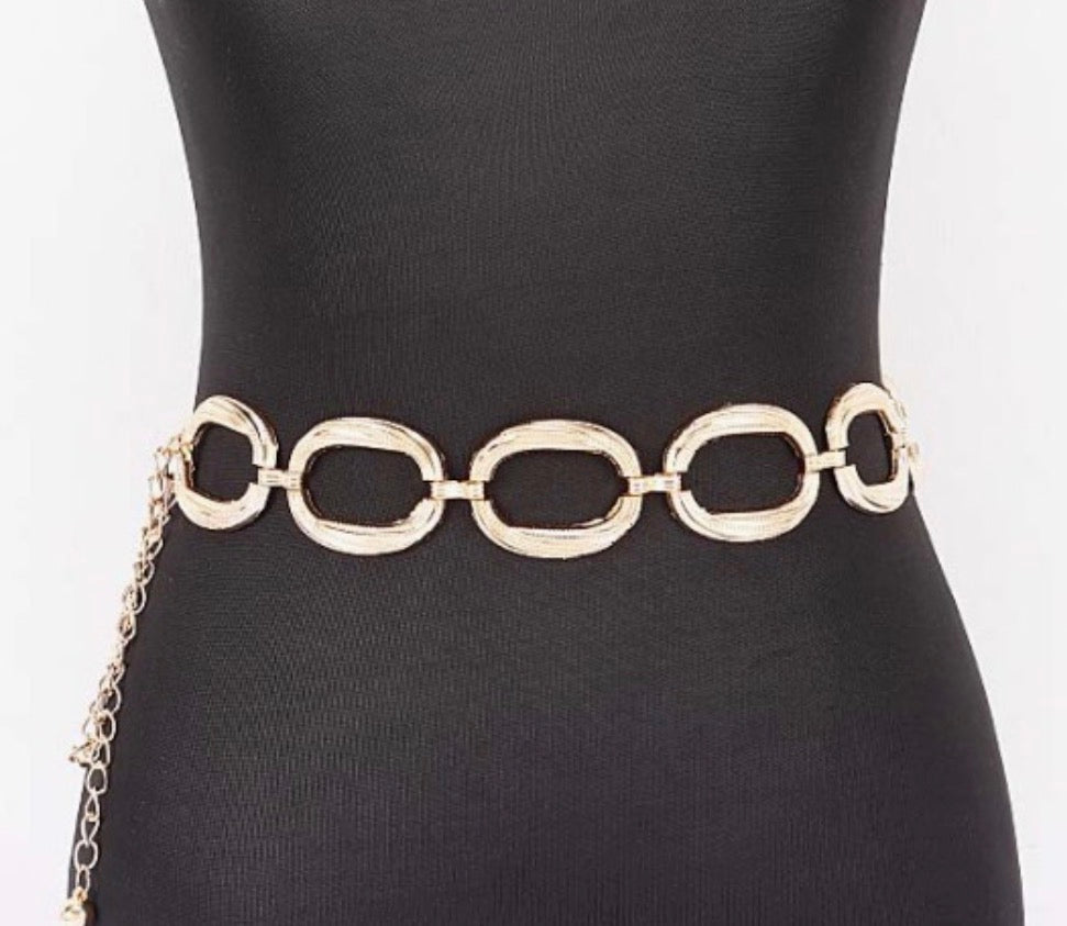 Silver and gold oval belt